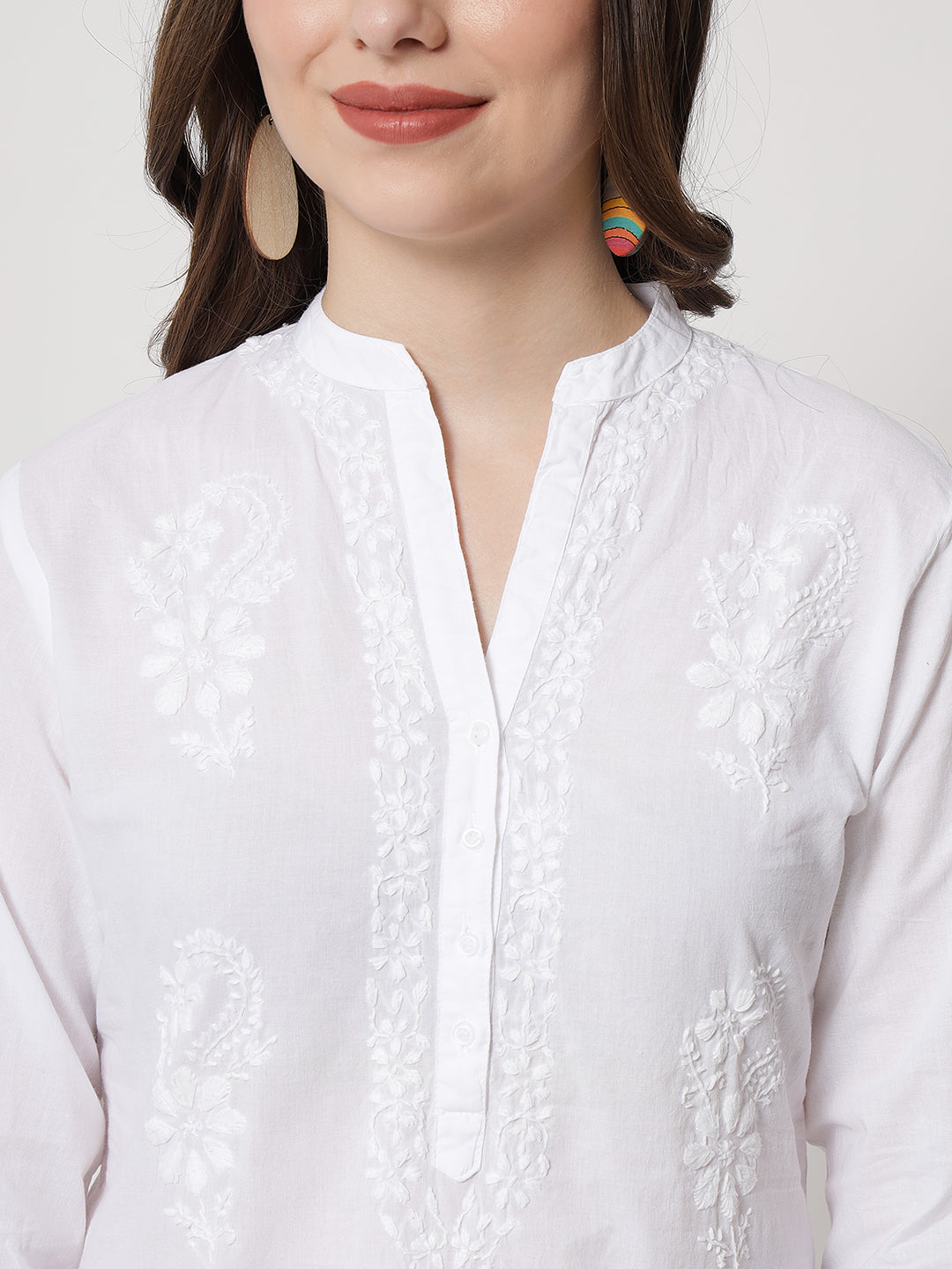 Dharya white-embroidered-v-neckline-straight-fit-kurti -has-embroidered-sleeves